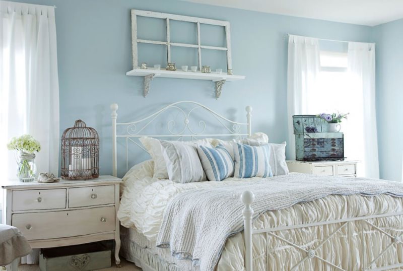Blue walls of the Provence style bedroom
