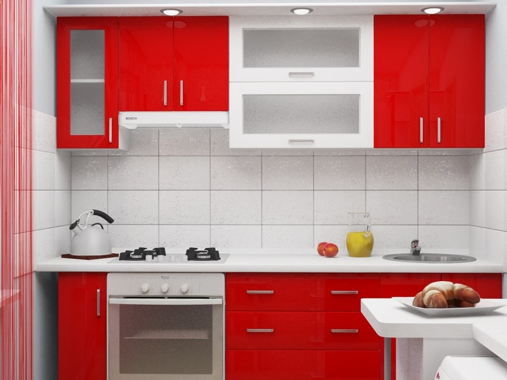 Mutfakta kırmızı bir set ile beyaz önlük