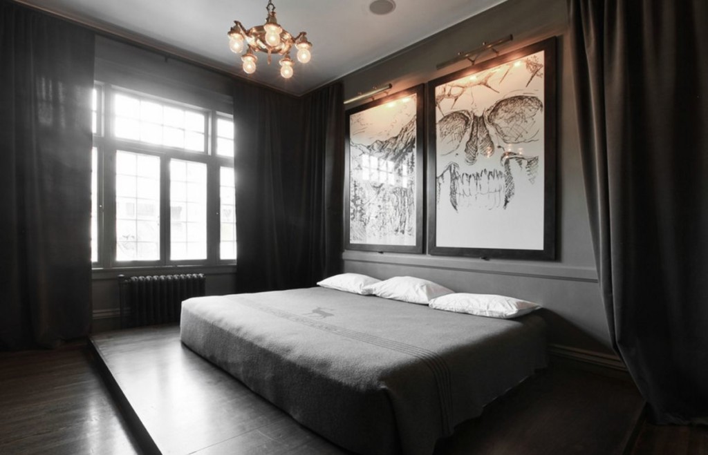 Large paintings above the bed in the bedroom
