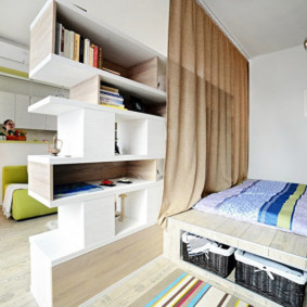 Bookcase between sleeping and living areas