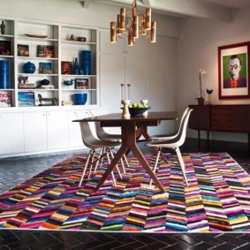 Dining group on a colorful rug