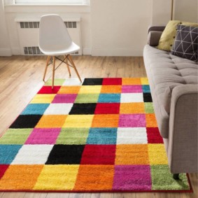 Bright ornament on the patchwork rug