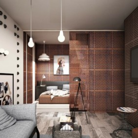 Perforated partition in a studio apartment
