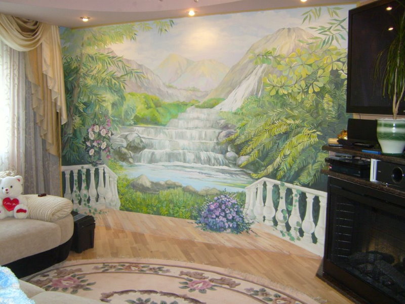 Drawn waterfall on the wall of the hall in a two-bedroom apartment