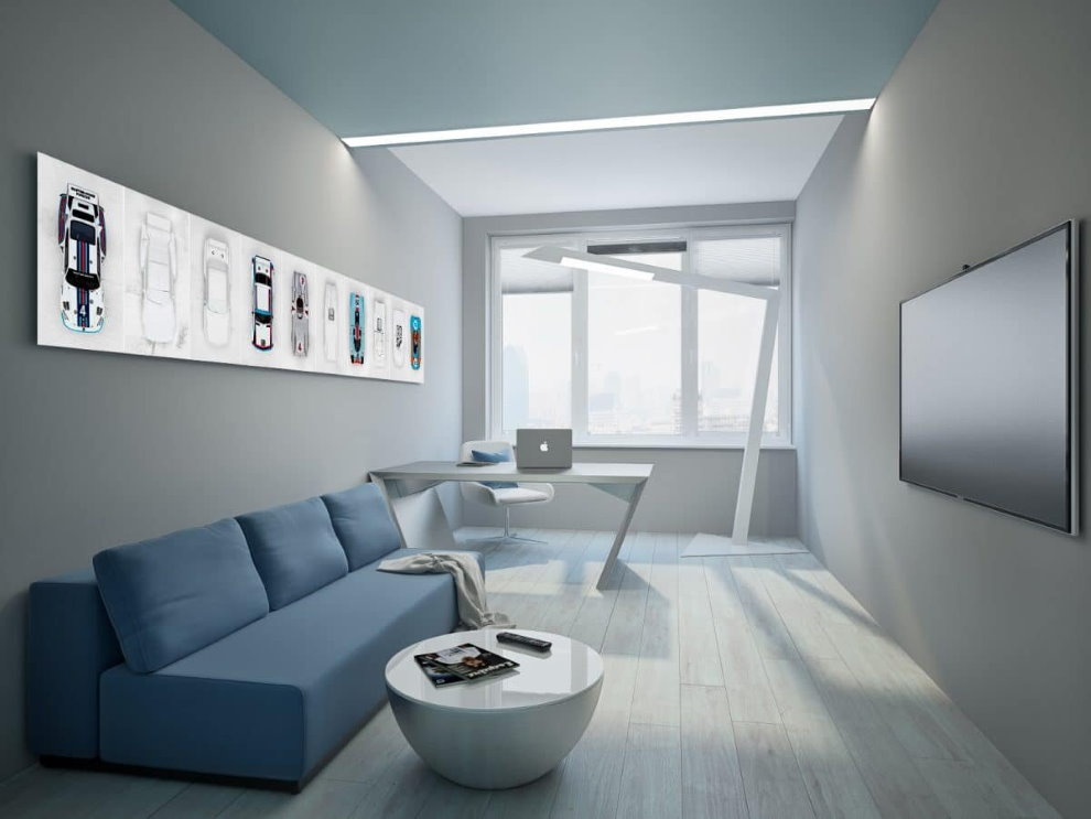 Une chambre étroite dans le style du minimalisme dans un appartement de deux pièces d'un célibataire