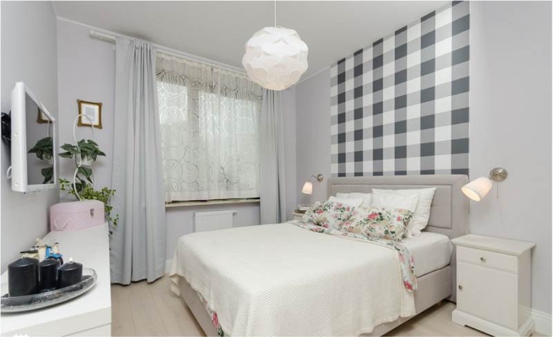 Patterned bedroom over the bed