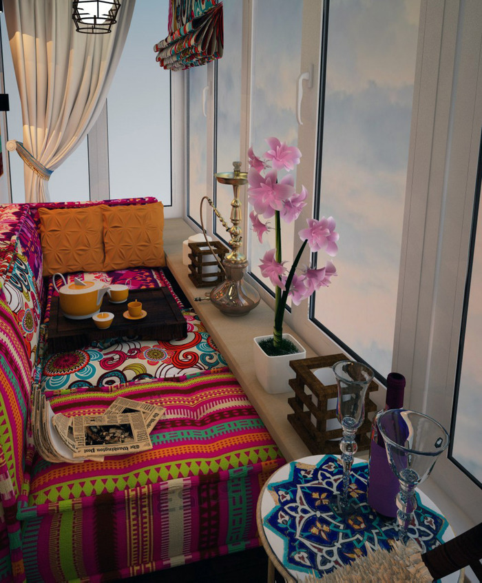 Bright textiles in the interior of the apartment balcony