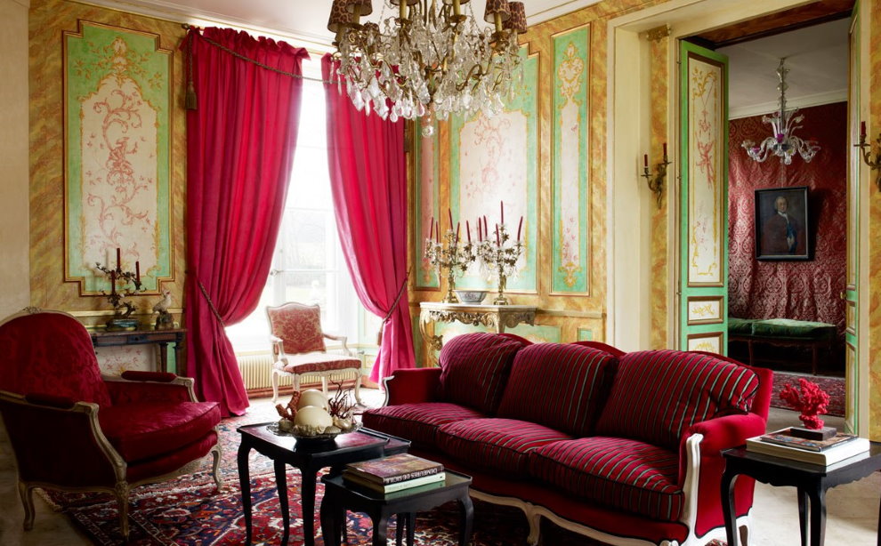 Living room interior with burgundy curtains