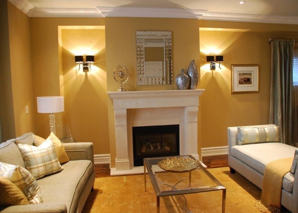 Paired sconces on either side of the fireplace