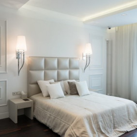 sconce in the bedroom over the bed photo design