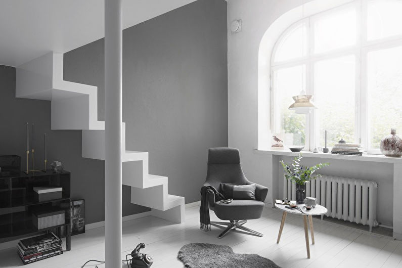 living room design in gray tones 17 sq m