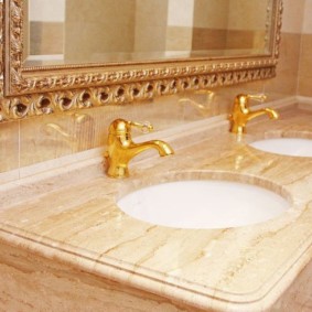 Gold taps in the bathroom