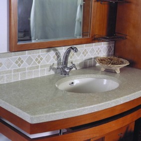 Bathroom faucet with chrome finish over the washbasin