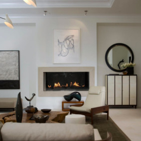 Fireplace in the white wall of the living room