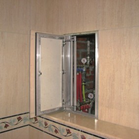 Concealed bathroom cabinet with countersunk door