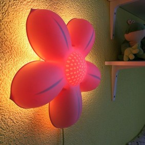 Wall-mounted night lamp with plastic housing