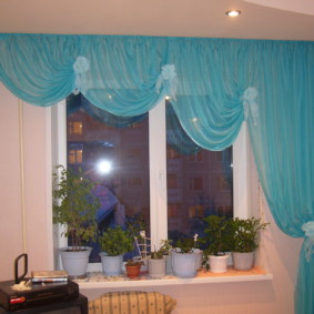 Asymmetric turquoise curtain