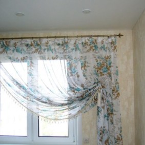 One-way curtain with ring mount