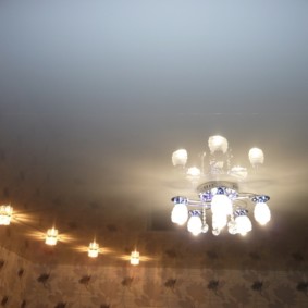 Small chandelier on the living room ceiling