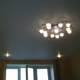 Hall ceiling with chandelier and built-in lights