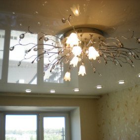 Contemporary chandelier on a stretch ceiling canvas