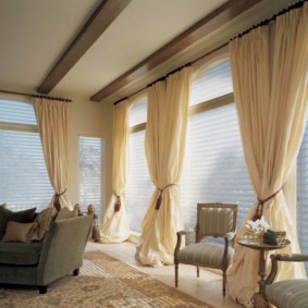 Beige floor-to-ceiling curtains