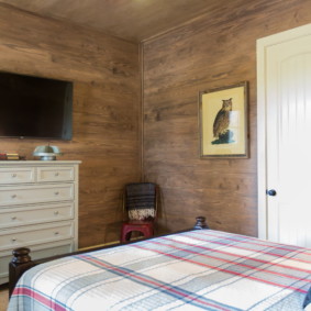 Chambre confortable dans une maison en bois