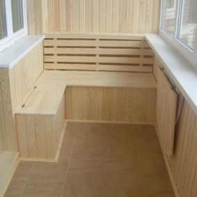 Box for vegetables on the balcony with wooden trim