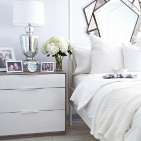 Bedside table with a white facade
