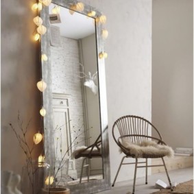 Decorative illumination of the floor mirror