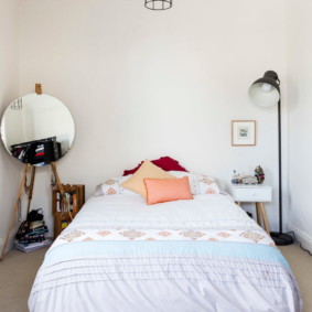 Rustic bedroom with floor mirror