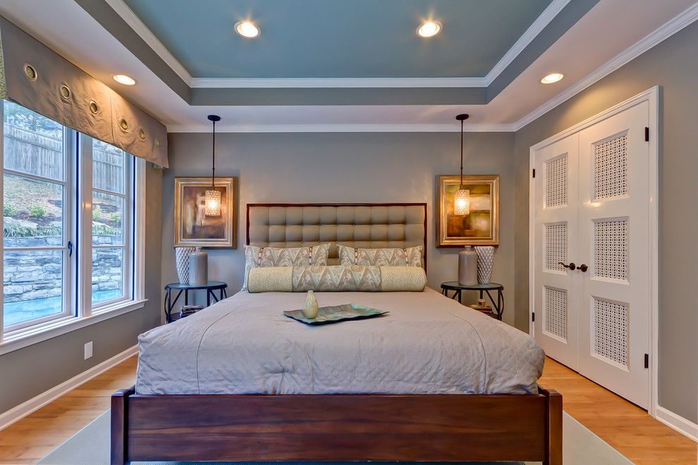 Two-level ceiling in a bedroom of a modern style