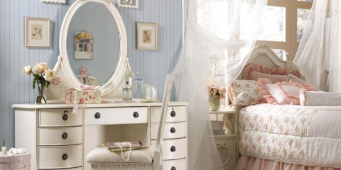 dresser with a mirror in the bedroom