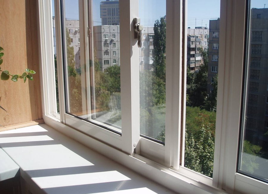 Sliding balcony glazing in a city apartment
