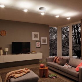 Linear placement of lights on the living room ceiling