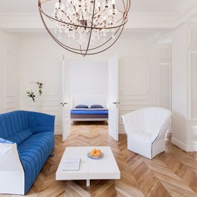 White interior room with parquet on the floor