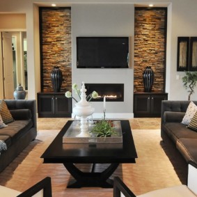 Black furniture in the living room of a private house