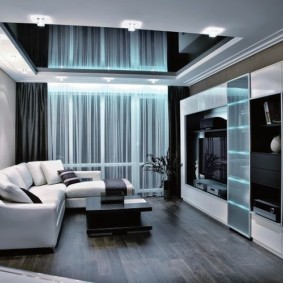 Black stretch ceiling in a small living room