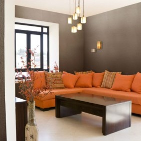 Bright sofa upholstery on a background of gray walls