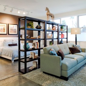 Open shelving unit as a living room divider