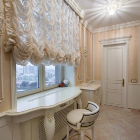 French curtains in the room of a young fashionista