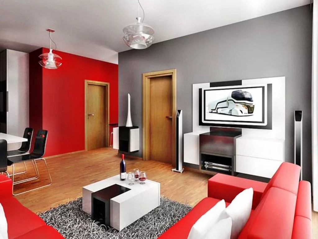 Canapé rouge dans une pièce avec un mur gris