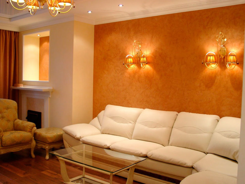 Wall decor behind the sofa with liquid wallpaper