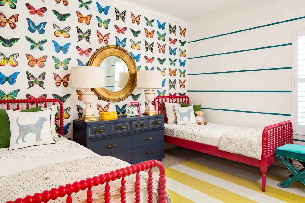 Colorful butterflies on paper wallpaper in a nursery