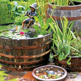 small pond from a wooden barrel