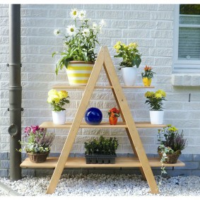Wooden shelf for placing flower pots
