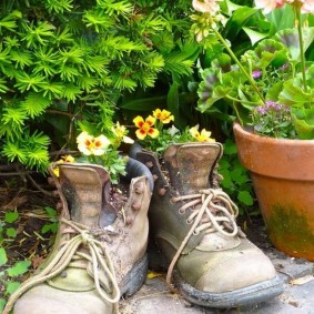 Flower pots of holey boots