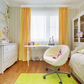 Yellow curtains in the nursery