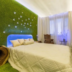 السجاد الأخضر على جدار غرفة نوم الأطفال