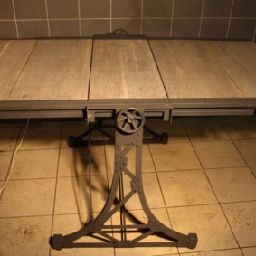 Folding table on a steel frame for loft interior